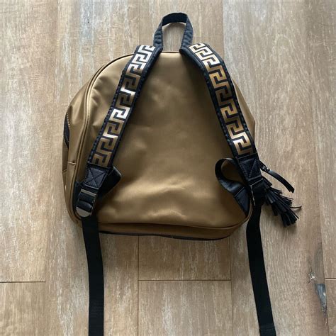 versace parfüm mit rucksack